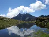vom Gipfel Langschneid Abstieg zur Bruggeralm hinten die Rote Spitze