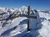 Gipfelkreuz Innerrodelgungge mit dem Deferegger Kärlskopf im Hintergrund